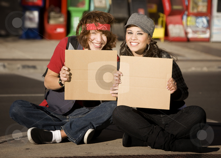 To use this stock image in your creative project, please select the size you need over to the right and click the "Add to Cart" button.
Your downloaded image will come with the Cutcaster watermark removed so don’t worry about the watermark you see on this page. Young Man and Woman with Blank Cardboard Signs stock photo, Attractive Young Man and Woman with Blank Cardboard Signs by Scott Griessel