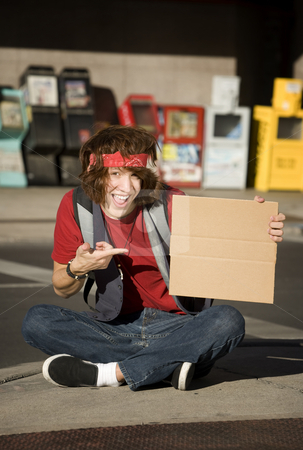 To use this stock image in your creative project, please select the size you need over to the right and click the "Add to Cart" button.
Your downloaded image will come with the Cutcaster watermark removed so don’t worry about the watermark you see on this page. Young Man with Blank Cardboard Sign stock photo, Young Man on Street Corner with Blank Cardboard Sign by Scott Griessel