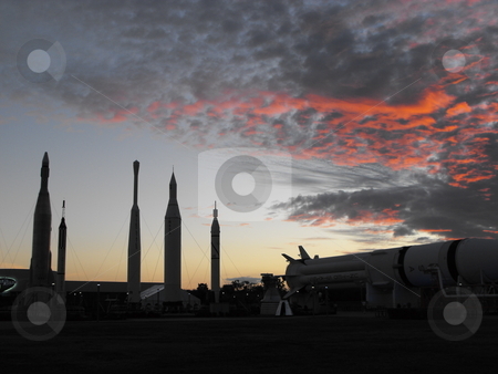 To use this stock image in your creative project, please select the size you need over to the right and click the "Add to Cart" button.
Your downloaded image will come with the Cutcaster watermark removed so don’t worry about the watermark you see on this page. Kennedy Space Center Rocket Garden stock photo, NASA's Kennedy Space Center Visitor Complex is one of Florida's most popular, must see, tourist destinations with static displays of the historic NASA rockets in the center's Rocket Garden. Used to launch early satellites and probes, the rockets have special lighting at night. by Dennis Thomsen