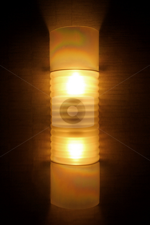 To use this stock image in your creative project, please select the size you need over to the right and click the "Add to Cart" button.
Your downloaded image will come with the Cutcaster watermark removed so don’t worry about the watermark you see on this page. Modern Light Fixture stock photo, A modern light fixture hanging on a brown wall by Kevin Tietz