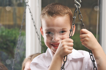 To use this stock image in your creative project, please select the size you need over to the right and click the "Add to Cart" button.
Your downloaded image will come with the Cutcaster watermark removed so don’t worry about the watermark you see on this page. Adorable Young Boy Smiles stock photo, Adorable Young Boy with Blue Eyes Smiles for the Camera by Andy Dean