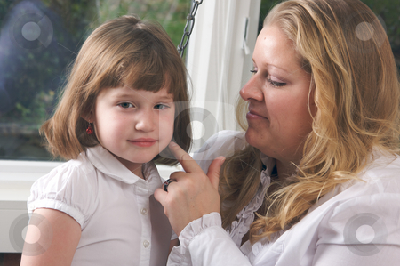 To use this stock image in your creative project, please select the size you need over to the right and click the "Add to Cart" button.
Your downloaded image will come with the Cutcaster watermark removed so don’t worry about the watermark you see on this page. Young Mother and Daughter stock photo, Young Mother and Daughter Enjoying a Personal Moment by Andy Dean