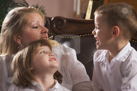 To use this stock image in your creative project, please select the size you need over to the right and click the "Add to Cart" button.
Your downloaded image will come with the Cutcaster watermark removed so don’t worry about the watermark you see on this page. Mother and Children stock photo, Mother and Children Enjoying a Fun Moment by Andy Dean