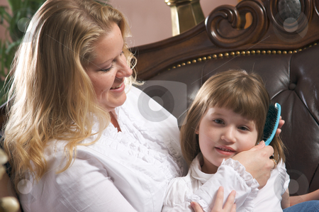 To use this stock image in your creative project, please select the size you need over to the right and click the "Add to Cart" button.
Your downloaded image will come with the Cutcaster watermark removed so don’t worry about the watermark you see on this page. Young Mother and Daughter stock photo, Young Mother and Daughter Enjoying a Personal Moment by Andy Dean