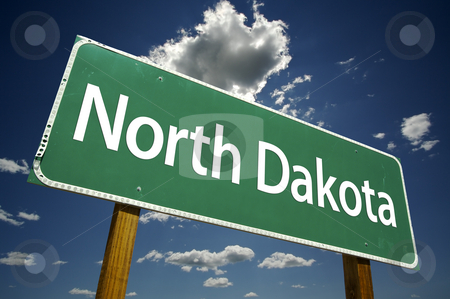 To use this stock image in your creative project, please select the size you need over to the right and click the "Add to Cart" button.
Your downloaded image will come with the Cutcaster watermark removed so don’t worry about the watermark you see on this page. North Dakota Road Sign stock photo, North Dakota Road Sign with dramatic clouds and sky. by Andy Dean