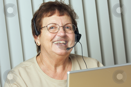 To use this stock image in your creative project, please select the size you need over to the right and click the "Add to Cart" button.
Your downloaded image will come with the Cutcaster watermark removed so don’t worry about the watermark you see on this page. Smiling Senior Adult with Telephone Headset stock photo, Smiling Senior Adult with Telephone Headset by Andy Dean