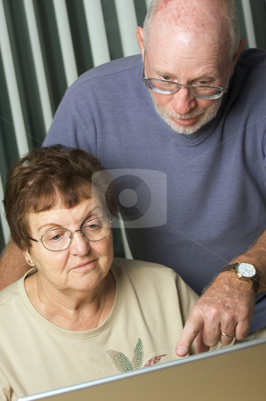 To use this stock image in your creative project, please select the size you need over to the right and click the "Add to Cart" button.
Your downloaded image will come with the Cutcaster watermark removed so don’t worry about the watermark you see on this page. Senior Adults on Laptop Computer stock photo, Senior Adults on Working on a Laptop Computer by Andy Dean