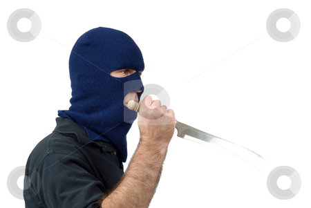 To use this stock image in your creative project, please select the size you need over to the right and click the "Add to Cart" button.
Your downloaded image will come with the Cutcaster watermark removed so don’t worry about the watermark you see on this page. Mugger stock photo, Isolated mugger with a knife and wearing a balaclava by Richard Nelson