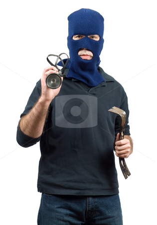 To use this stock image in your creative project, please select the size you need over to the right and click the "Add to Cart" button.
Your downloaded image will come with the Cutcaster watermark removed so don’t worry about the watermark you see on this page. Isolated Burglar stock photo, Isolated burglar holding a crowbar and a flashlight by Richard Nelson