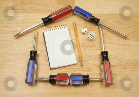 To use this stock image in your creative project, please select the size you need over to the right and click the "Add to Cart" button.
Your downloaded image will come with the Cutcaster watermark removed so don’t worry about the watermark you see on this page. House Shaped by Screwdrivers and Pad of Paper with Dice stock photo, House Shaped by Screwdrivers and Pad of Paper with Dice on a Wood Background. by Andy Dean