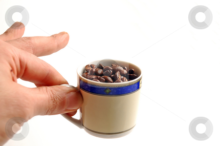 To use this stock image in your creative project, please select the size you need over to the right and click the "Add to Cart" button.
Your downloaded image will come with the Cutcaster watermark removed so don’t worry about the watermark you see on this page. Coffee beans cup stock photo, Cup of coffee beans on white background by Francesco Perre