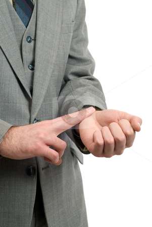 To use this stock image in your creative project, please select the size you need over to the right and click the "Add to Cart" button.
Your downloaded image will come with the Cutcaster watermark removed so don’t worry about the watermark you see on this page. Radial Pulse stock photo, Stressed businessman is checking his radial pulse using his fingers by Richard Nelson
