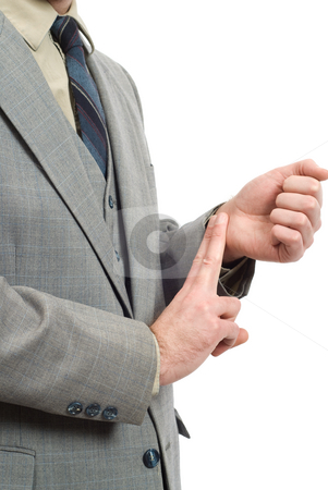 To use this stock image in your creative project, please select the size you need over to the right and click the "Add to Cart" button.
Your downloaded image will come with the Cutcaster watermark removed so don’t worry about the watermark you see on this page. Businessman Checking His Pulse stock photo, A businessman wearing a grey suit, checking his radial pulse with his fingers by Richard Nelson