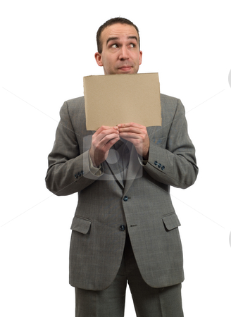 To use this stock image in your creative project, please select the size you need over to the right and click the "Add to Cart" button.
Your downloaded image will come with the Cutcaster watermark removed so don’t worry about the watermark you see on this page. Hopeful Businessman stock photo, A young businessman hopeful about the economy is holding a blank cardboard sign, isolated against a white background by Richard Nelson