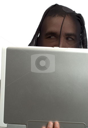 To use this stock image in your creative project, please select the size you need over to the right and click the "Add to Cart" button.
Your downloaded image will come with the Cutcaster watermark removed so don’t worry about the watermark you see on this page. Hacker stock photo, A male hacker wearing a pair of stockings, is working on a laptop computer, isolated against a white background by Richard Nelson