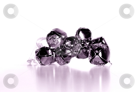 To use this stock image in your creative project, please select the size you need over to the right and click the "Add to Cart" button.
Your downloaded image will come with the Cutcaster watermark removed so don’t worry about the watermark you see on this page. Bells stock photo, Silver shiny bells in a group on white background by Henrik Lehnerer