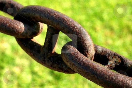 To use this stock image in your creative project, please select the size you need over to the right and click the "Add to Cart" button.
Your downloaded image will come with the Cutcaster watermark removed so don’t worry about the watermark you see on this page. Chain stock photo, Old rusty chain with green grass in the background. by Henrik Lehnerer