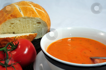 To use this stock image in your creative project, please select the size you need over to the right and click the "Add to Cart" button.
Your downloaded image will come with the Cutcaster watermark removed so don’t worry about the watermark you see on this page. Sourdough Bread And Tomato Soup stock photo, Hot Tomato soup in a bowl with bread on the side by Lynn Bendickson