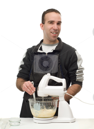 To use this stock image in your creative project, please select the size you need over to the right and click the "Add to Cart" button.
Your downloaded image will come with the Cutcaster watermark removed so don’t worry about the watermark you see on this page. Home Baker stock photo, A young baker is making something at home, isolated against a white background by Richard Nelson