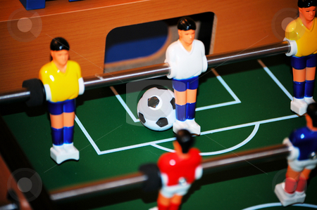 To use this stock image in your creative project, please select the size you need over to the right and click the "Add to Cart" button.
Your downloaded image will come with the Cutcaster watermark removed so don’t worry about the watermark you see on this page. About to score stock photo, It looks like a score on the foosball table by Tim Markley