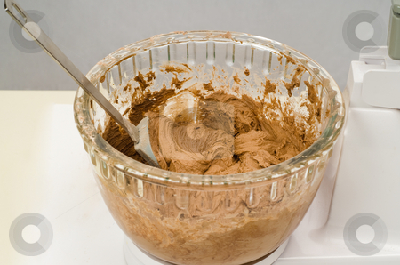 To use this stock image in your creative project, please select the size you need over to the right and click the "Add to Cart" button.
Your downloaded image will come with the Cutcaster watermark removed so don’t worry about the watermark you see on this page. Chocolate Cookie Batter stock photo, A bowl of freshly mixed chocolate cookie batter by Richard Nelson