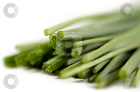 To use this stock image in your creative project, please select the size you need over to the right and click the "Add to Cart" button.
Your downloaded image will come with the Cutcaster watermark removed so don’t worry about the watermark you see on this page. Chives stock photo, Bundle of fresh green chives on white background. by Henrik Lehnerer