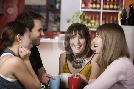 To use this stock image in your creative project, please select the size you need over to the right and click the "Add to Cart" button.
Your downloaded image will come with the Cutcaster watermark removed so don’t worry about the watermark you see on this page. Pretty Young Woman Surrounded by Friends stock photo, Pretty Young Woman Surrounded by Friends in a Coffee House by Scott Griessel