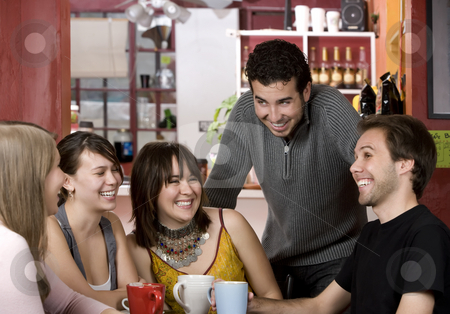 To use this stock image in your creative project, please select the size you need over to the right and click the "Add to Cart" button.
Your downloaded image will come with the Cutcaster watermark removed so don’t worry about the watermark you see on this page. Friends in a Coffee House stock photo, Five young friends in a coffee house by Scott Griessel