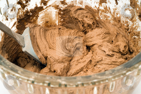 To use this stock image in your creative project, please select the size you need over to the right and click the "Add to Cart" button.
Your downloaded image will come with the Cutcaster watermark removed so don’t worry about the watermark you see on this page. Mixed Chocolate Cookie Batter stock photo, A glass bowl filled with chocolate cookie batter by Richard Nelson