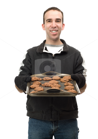 To use this stock image in your creative project, please select the size you need over to the right and click the "Add to Cart" button.
Your downloaded image will come with the Cutcaster watermark removed so don’t worry about the watermark you see on this page. Baker With Cookies stock photo, A young baker holding a sheet of chocolate chip cookies, isolated against a white background by Richard Nelson