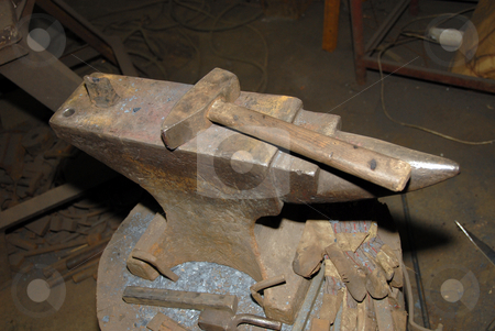 To use this stock image in your creative project, please select the size you need over to the right and click the "Add to Cart" button.
Your downloaded image will come with the Cutcaster watermark removed so don’t worry about the watermark you see on this page. Hammer and anvil stock photo, Hammer and anvil in an old smithy by Joanna Szycik