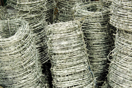 To use this stock image in your creative project, please select the size you need over to the right and click the "Add to Cart" button.
Your downloaded image will come with the Cutcaster watermark removed so don’t worry about the watermark you see on this page. Barbed wire stock photo, Barbed wire in shop ready to buy by Joanna Szycik