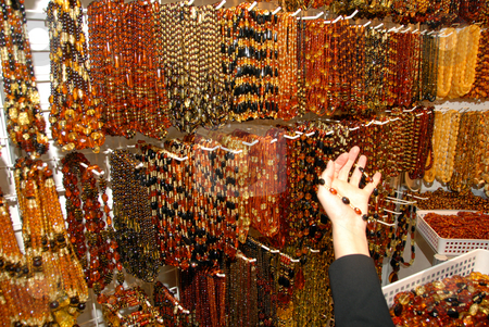 To use this stock image in your creative project, please select the size you need over to the right and click the "Add to Cart" button.
Your downloaded image will come with the Cutcaster watermark removed so don’t worry about the watermark you see on this page. Amber necklaces stock photo, Amber necklaces. Natural beauty of balic sea. by Joanna Szycik