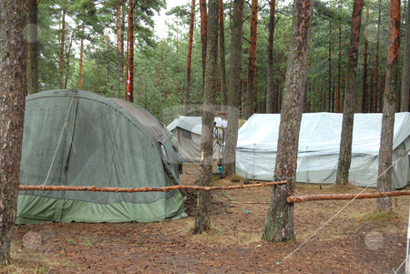 To use this stock image in your creative project, please select the size you need over to the right and click the "Add to Cart" button.
Your downloaded image will come with the Cutcaster watermark removed so don’t worry about the watermark you see on this page. Boy Scout Camp stock photo, Typical campsite at a Boy Scout Camp by Joanna Szycik