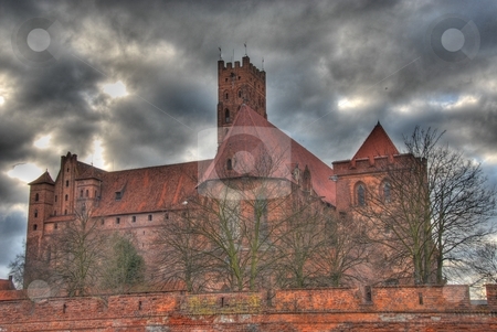 To use this stock image in your creative project, please select the size you need over to the right and click the "Add to Cart" button.
Your downloaded image will come with the Cutcaster watermark removed so don’t worry about the watermark you see on this page. Castle in Malbork stock photo, A Middle Castle in Malbork, Poland in Europe by Joanna Szycik