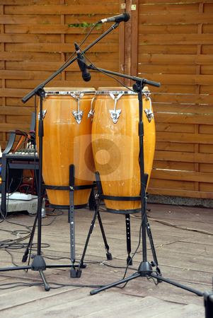 To use this stock image in your creative project, please select the size you need over to the right and click the "Add to Cart" button.
Your downloaded image will come with the Cutcaster watermark removed so don’t worry about the watermark you see on this page. Two bongos stock photo, Two bongos made of wood and leather by Joanna Szycik