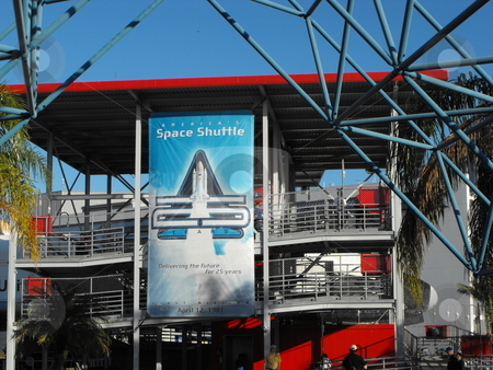 To use this stock image in your creative project, please select the size you need over to the right and click the "Add to Cart" button.
Your downloaded image will come with the Cutcaster watermark removed so don’t worry about the watermark you see on this page. Kennedy Space Center stock photo, One of the main attractions at NASA's Kennedy Space Center Visitor Complex is a very realistic Shuttle Launch Simulator which has a multi-story covered entrance for visitors. The space shuttle celebrated it's 25th anniversary in 2008. by Dennis Thomsen