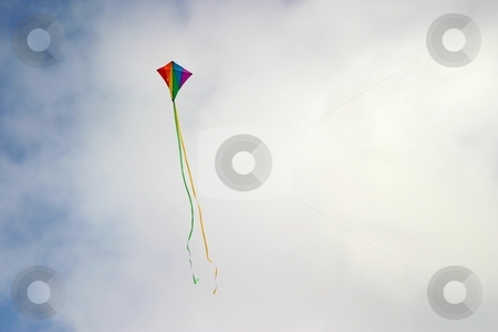 To use this stock image in your creative project, please select the size you need over to the right and click the "Add to Cart" button.
Your downloaded image will come with the Cutcaster watermark removed so don’t worry about the watermark you see on this page. Kite stock photo, Kite up in the sky with clouds in the background. by Henrik Lehnerer