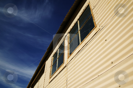 To use this stock image in your creative project, please select the size you need over to the right and click the "Add to Cart" button.
Your downloaded image will come with the Cutcaster watermark removed so don’t worry about the watermark you see on this page. Windows on a Mteal Building stock photo, Windows on an old currugated metal building. by Scott Griessel