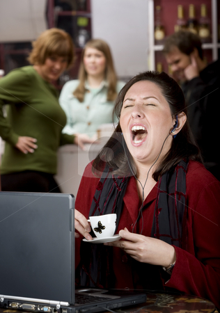 To use this stock image in your creative project, please select the size you need over to the right and click the "Add to Cart" button.
Your downloaded image will come with the Cutcaster watermark removed so don’t worry about the watermark you see on this page. Obnoxious young woman singing loudly stock photo, Obnoxious young woman singing loudly in a coffee house by Scott Griessel
