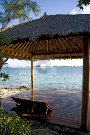 To use this stock image in your creative project, please select the size you need over to the right and click the "Add to Cart" button.
Your downloaded image will come with the Cutcaster watermark removed so don’t worry about the watermark you see on this page. Beach hut on tropical island stock photo, Beach hut on small and beautiful tropical island. by Robert Ranson