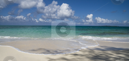 To use this stock image in your creative project, please select the size you need over to the right and click the "Add to Cart" button.
Your downloaded image will come with the Cutcaster watermark removed so don’t worry about the watermark you see on this page. Beautiful tropical beach shoreline stock photo, Beautiful tropical beach with white sand and clear green water. by Robert Ranson