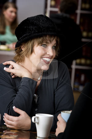 To use this stock image in your creative project, please select the size you need over to the right and click the "Add to Cart" button.
Your downloaded image will come with the Cutcaster watermark removed so don’t worry about the watermark you see on this page. Woman with Friend in Coffee House stock photo, Pretty adult woman with friend in a coffee house by Scott Griessel