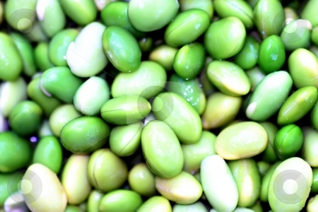 To use this stock image in your creative project, please select the size you need over to the right and click the "Add to Cart" button.
Your downloaded image will come with the Cutcaster watermark removed so don’t worry about the watermark you see on this page. Edamames stock photo, Group of bright green edamame soy beans. by Henrik Lehnerer
