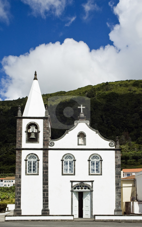 To use this stock image in your creative project, please select the size you need over to the right and click the "Add to Cart" button.
Your downloaded image will come with the Cutcaster watermark removed so don’t worry about the watermark you see on this page. White church stock photo, Small church in Pico Island, Azores, Portugal by Manuel Ribeiro