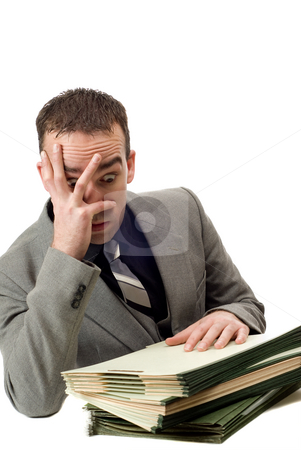 To use this stock image in your creative project, please select the size you need over to the right and click the "Add to Cart" button.
Your downloaded image will come with the Cutcaster watermark removed so don’t worry about the watermark you see on this page. Overworked Businessman stock photo, An overworked businessman looking stressed, isolated against a white background by Richard Nelson