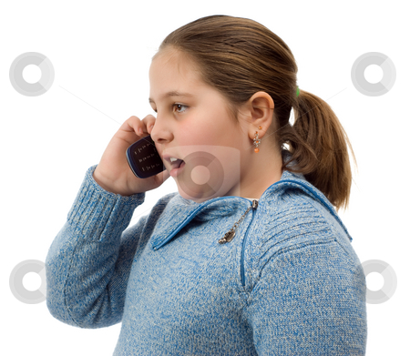 To use this stock image in your creative project, please select the size you need over to the right and click the "Add to Cart" button.
Your downloaded image will come with the Cutcaster watermark removed so don’t worry about the watermark you see on this page. Girl Talking On The Phone stock photo, A young girl talking on a cell phone, isolated against a white background by Richard Nelson