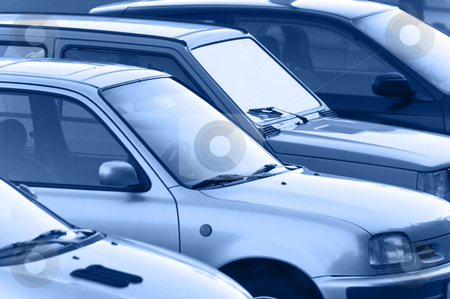 To use this stock image in your creative project, please select the size you need over to the right and click the "Add to Cart" button.
Your downloaded image will come with the Cutcaster watermark removed so don’t worry about the watermark you see on this page. Cars stock photo, Parking cars - blue toned by Massimiliano Leban