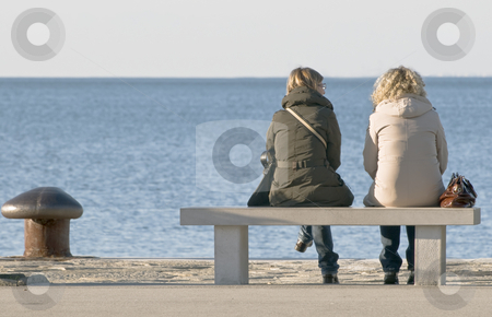 To use this stock image in your creative project, please select the size you need over to the right and click the "Add to Cart" button.
Your downloaded image will come with the Cutcaster watermark removed so don’t worry about the watermark you see on this page. Women talking stock photo, Two women chattin on a bench by Massimiliano Leban