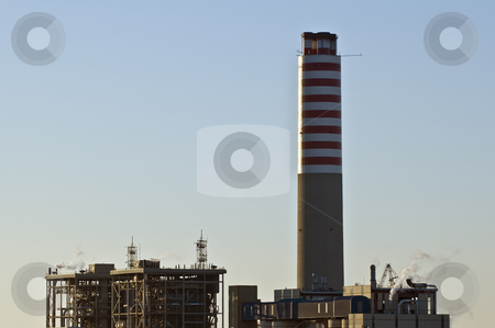 To use this stock image in your creative project, please select the size you need over to the right and click the "Add to Cart" button.
Your downloaded image will come with the Cutcaster watermark removed so don’t worry about the watermark you see on this page. Power plant stock photo, View of a power plant with an high chimney at sunrise by Massimiliano Leban
